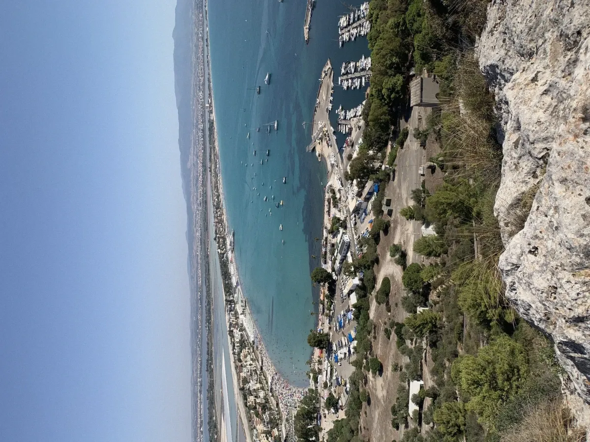 Poetto beach seen from the Sella del Diavolo headland with the Gulf of Cagliari beyond, Sardinia
