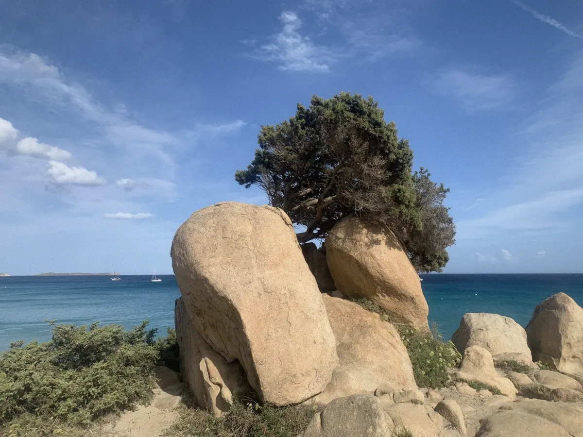 Simius Beach at Villasimius with turquoise water, the east-coast waters the full-day sailing trip from Cagliari heads toward